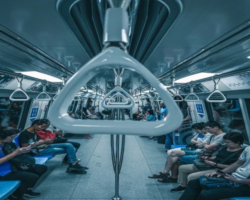 People using public transport in a city